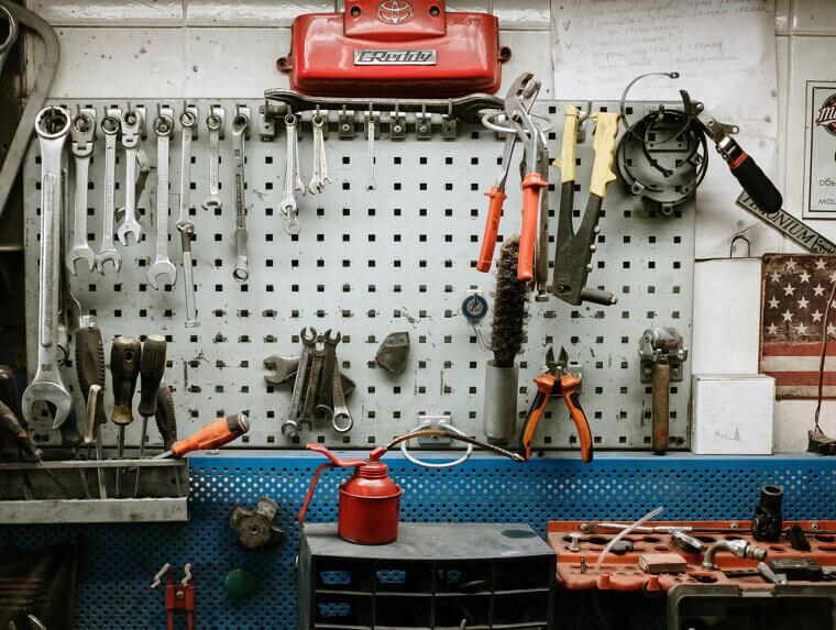 Use Pegboards for Vertical Tool Organization