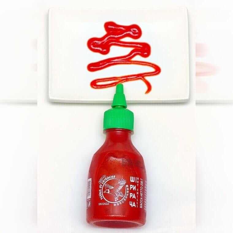 Squeeze Sriracha Into Your Deviled Eggs for a Lingering Heat That Completely Modernizes a Retro Appetizer