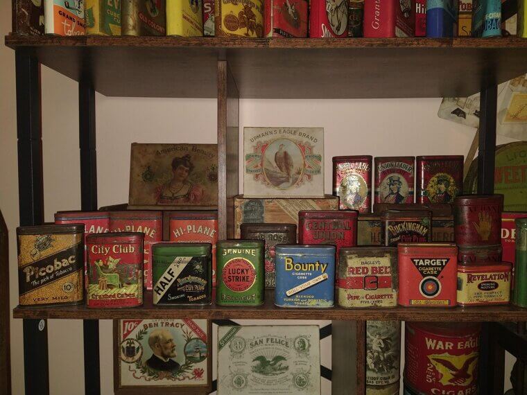 Old Tobacco Tins Sitting in Garages