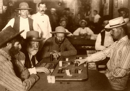 A Group of Men Playing Faro in a Western Saloon