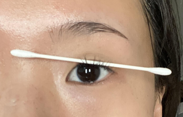 Using a Clean Cotton Swab as an Eyelash Curler