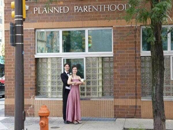 ​Posing In Front Of Planned Parenthood