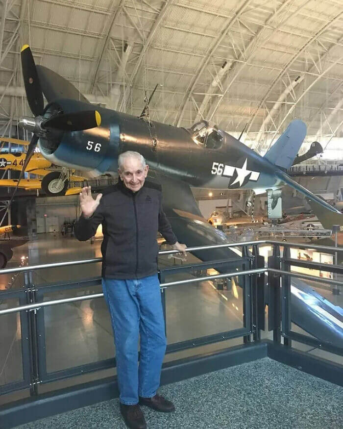 Posing In Front Of The Plane He Flew In WWII