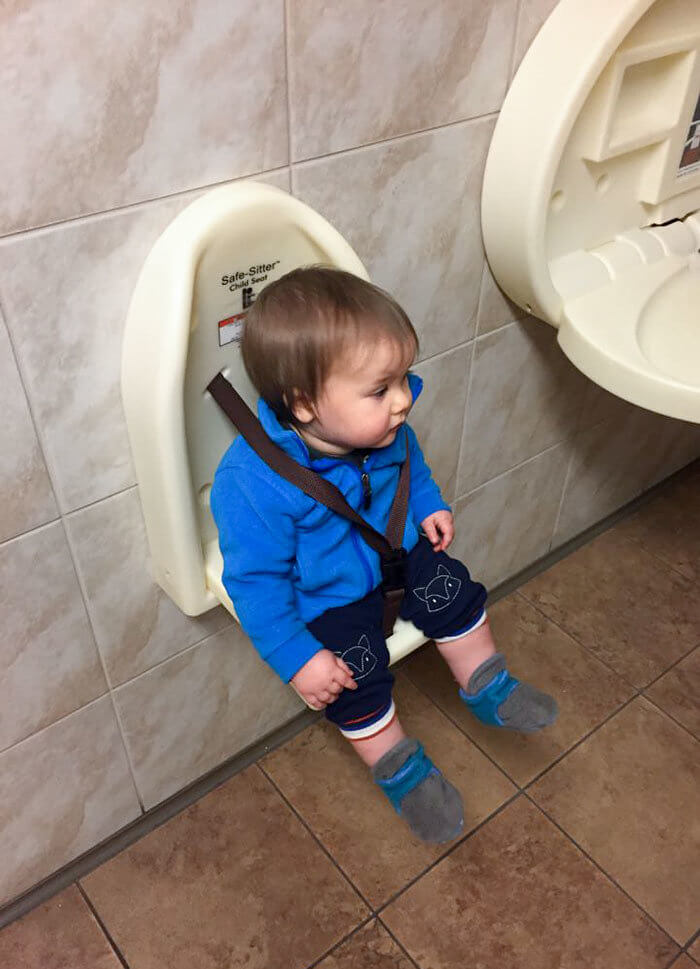 A Child Seat in a Public Restroom to Keep Kids Safe