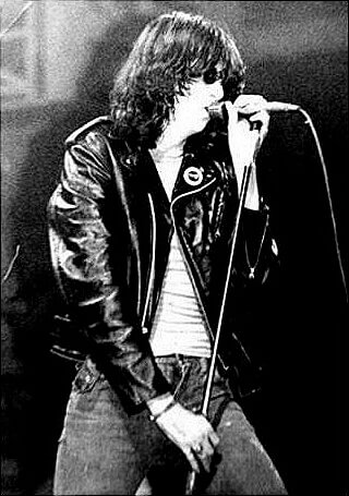 Joey Ramone Hanging Paintings As An Art Gallery Assistant