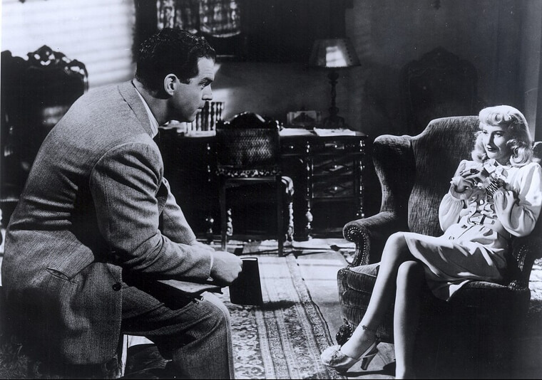 Barbara Stanwyck’s Dangerous Anklet and Velvet Gown in "Double Indemnity"
