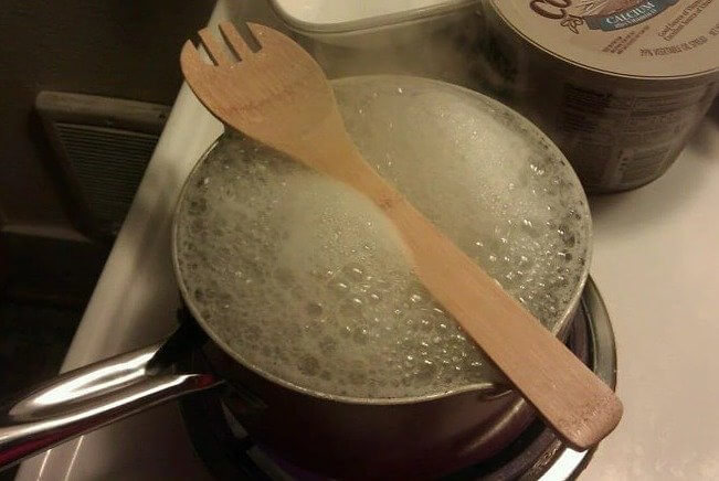 Place Wooden Spoon Like This to Stop Boiling Pots From Overflowing