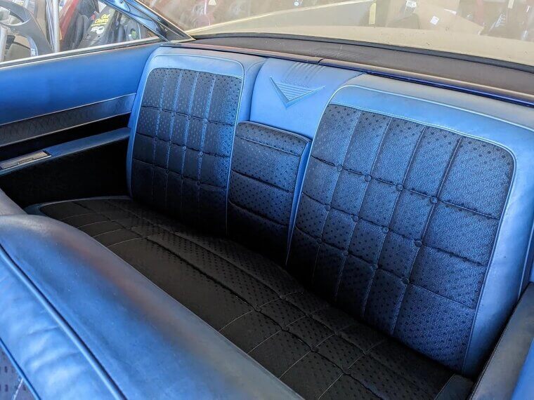 Slick Vinyl Seats Left Passengers Sliding Sideways