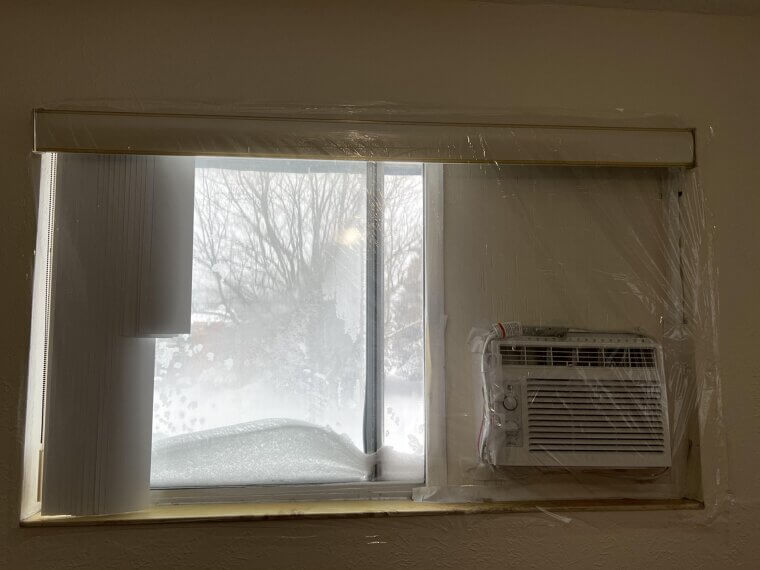 Apply Shrink-Film Window Insulation