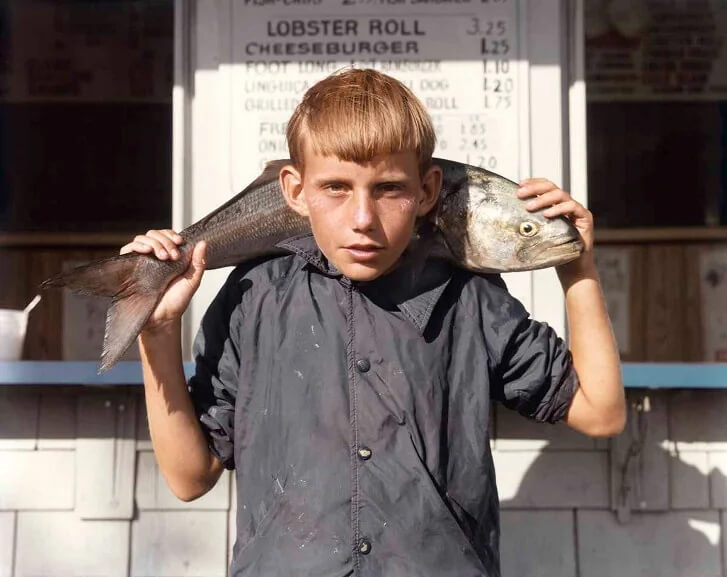 A Boy Posing With His Catch in 1980—When Simple Moments Meant Everything