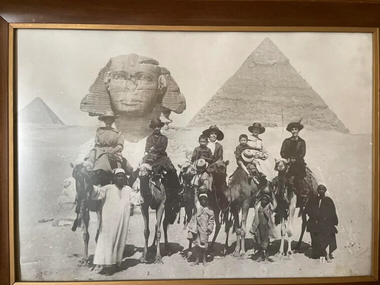 A Family Posing by the Great Sphinx and Pyramids in Early Egypt Tourism
