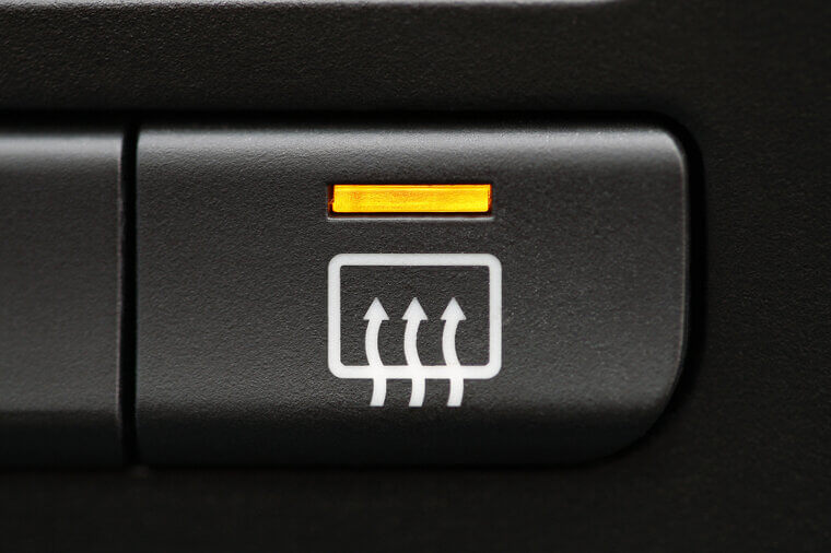 Wavy Lines With Up Arrows Means Rear Defrost