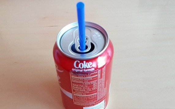 Soda Cans Have Place-Holders for Your Straw