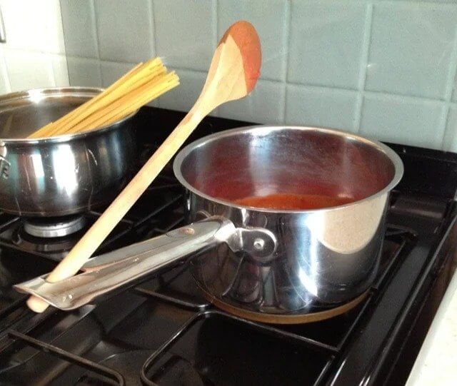 Pots and Pans Have Holes in the Handles to Rest Your Spoon