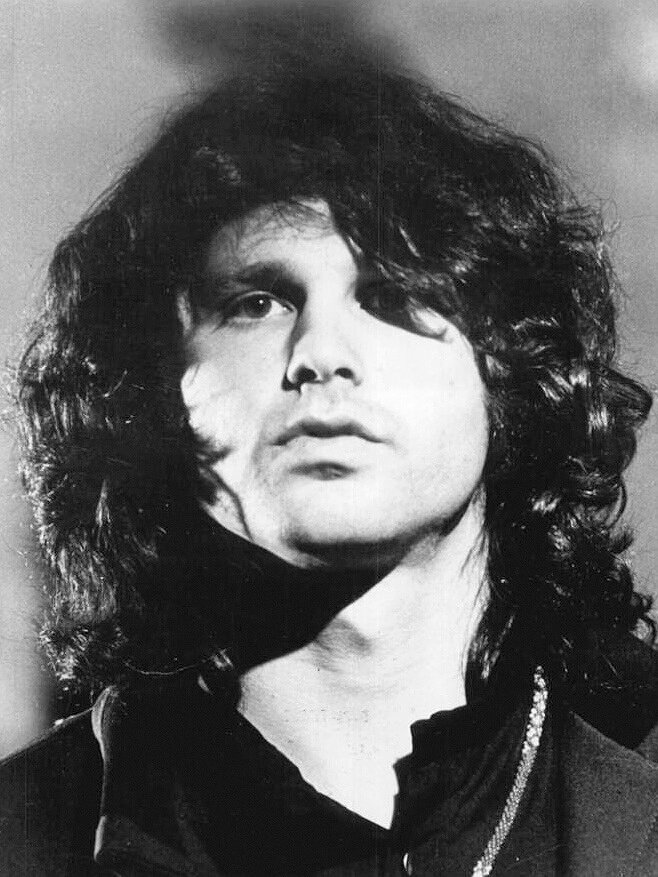 Jim Morrison's Terrifying Window-Smashing Stunt Dangling From a High-Rise