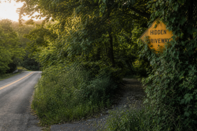 "Hidden Driveway" Signs That Sound Like Spy Movies