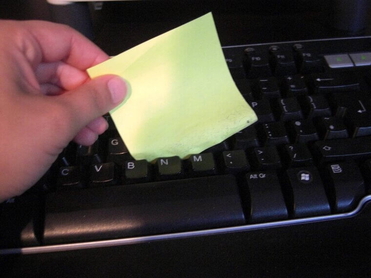 Clean Your Keyboard With Sticky Notes
