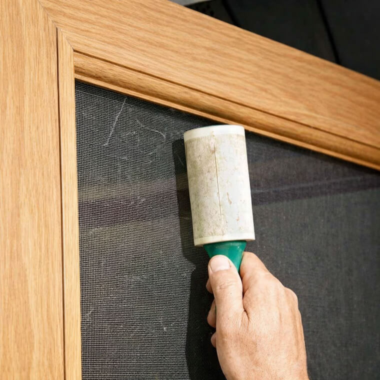 Use a Lint Roller on Screen Doors