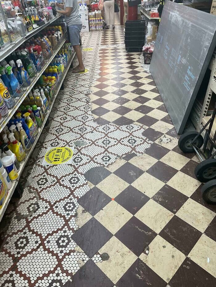 Worn Away Linoleum Tile Where Customers Tend To Line Up