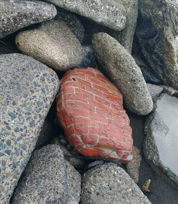 This Brick Wall Got Smoothed Into A Rock