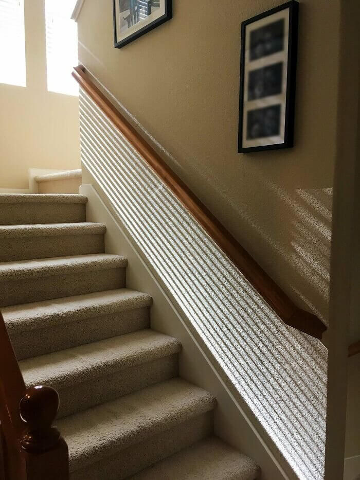 The Way the Shadows From These Blinds Slot Under the Handrail