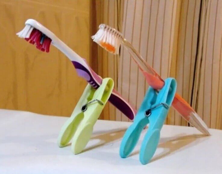 Use Clothes Pegs to Evade Germy Toothbrushes