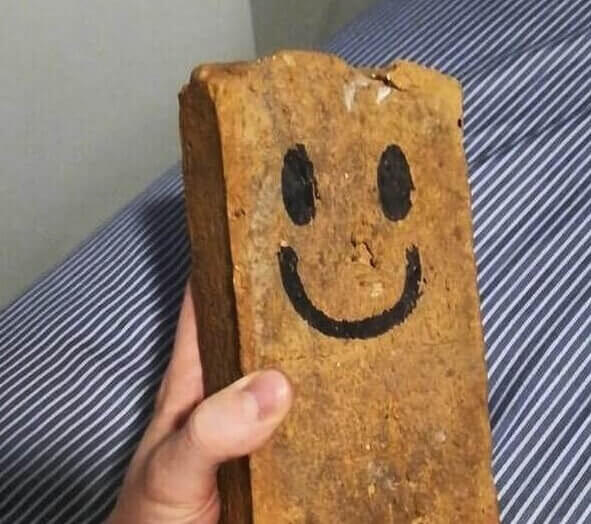 A Smiling Brick - Are You Serious?