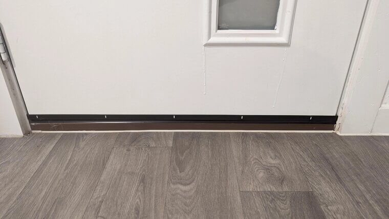 Add Door Sweeps and Thresholds