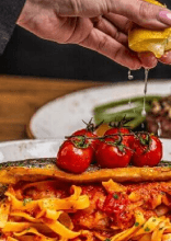 30 Restaurant Dishes That Cost More Today Because of What’s on the Plate