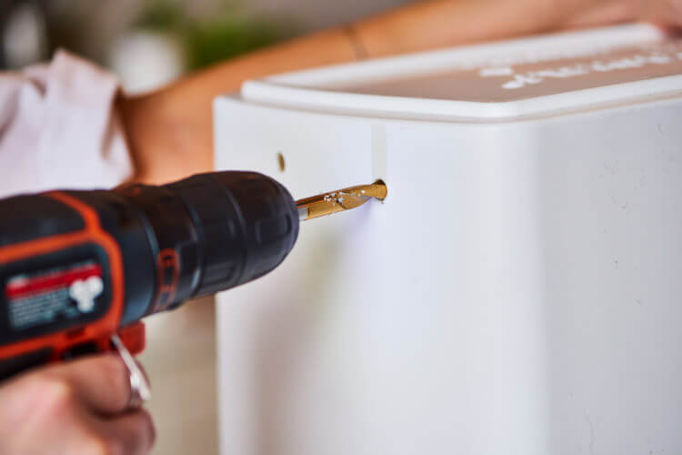 Drill A Hole In Your Garbage Can To Avoid Suction