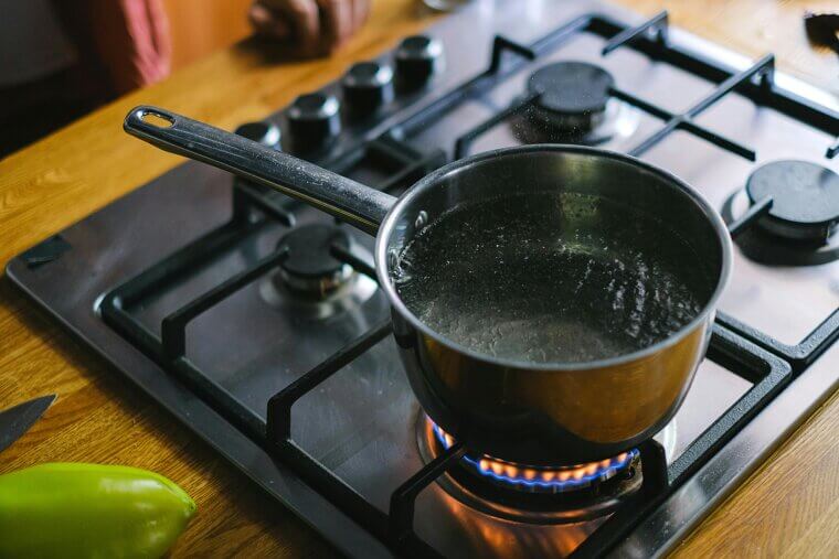 Boiling Water for Sturdy Grease and Oil Stains