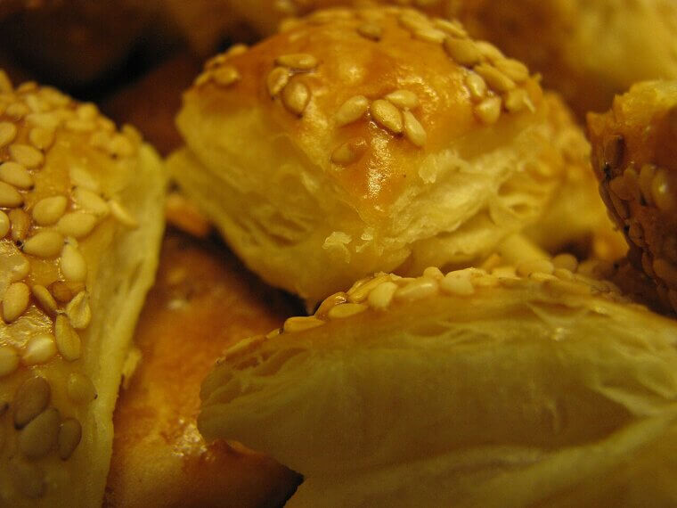 An apprentice baker forgot to mix butter into his dough and frantically folded it in later, accidentally birthing light and flaky puff pastry