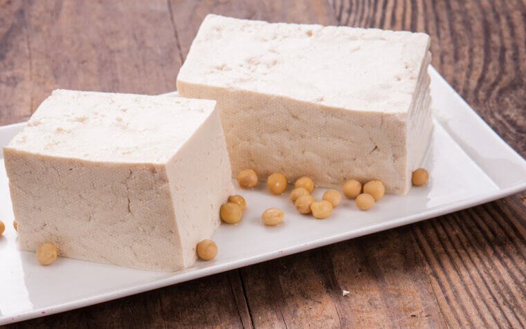 An ancient Chinese servant dropped unrefined sea salt into hot soy milk, accidentally curdling the liquid to invent firm tofu blocks