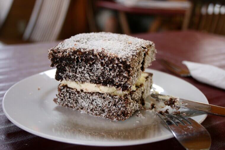 A Frantic Maid Accidentally Dropped a Sponge Cake Into Melted Chocolate and Covered It With Coconut, Creating the Beloved Australian Lamington Cake