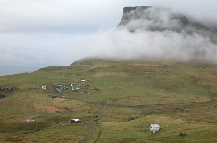 Explore the Mist-Covered Cliffs of the Faroe Islands