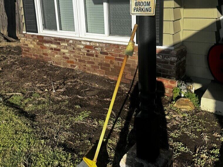 Broomstick Parking Sign