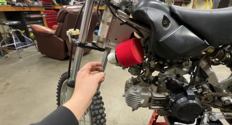 Cover the Intake With a Breathable Filter Sock