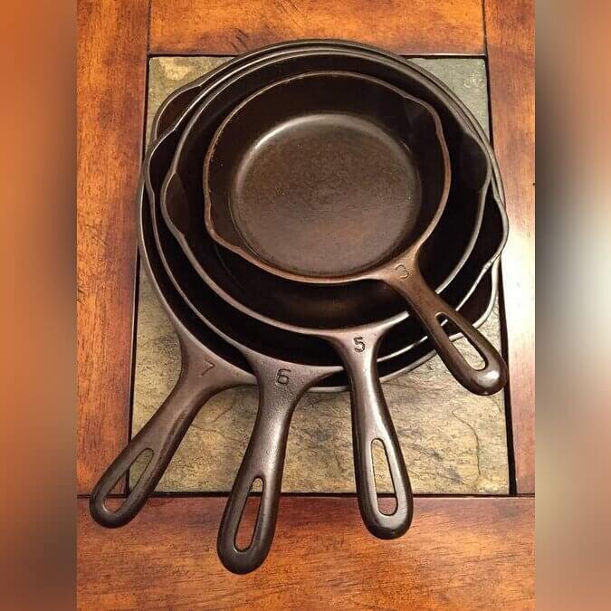 Cast Iron Cookware Stacked in Corners