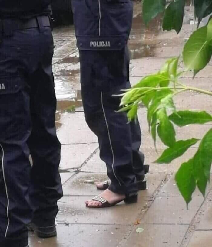 Apparently Boots Are Optional For This Police Person On The Job