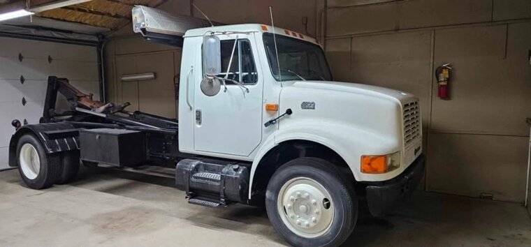 ​1998 International 4700 Trash Truck: $30,000
