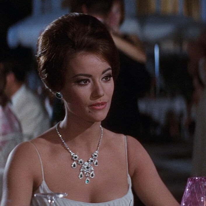 18. Domino Derval Played by: Claudine Auger