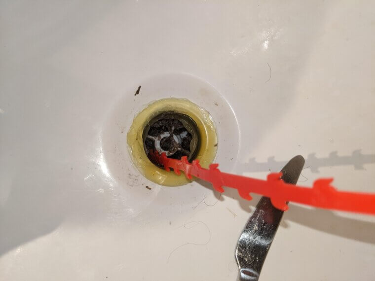 Clearing a Clogged Drain Using a Drain Snake