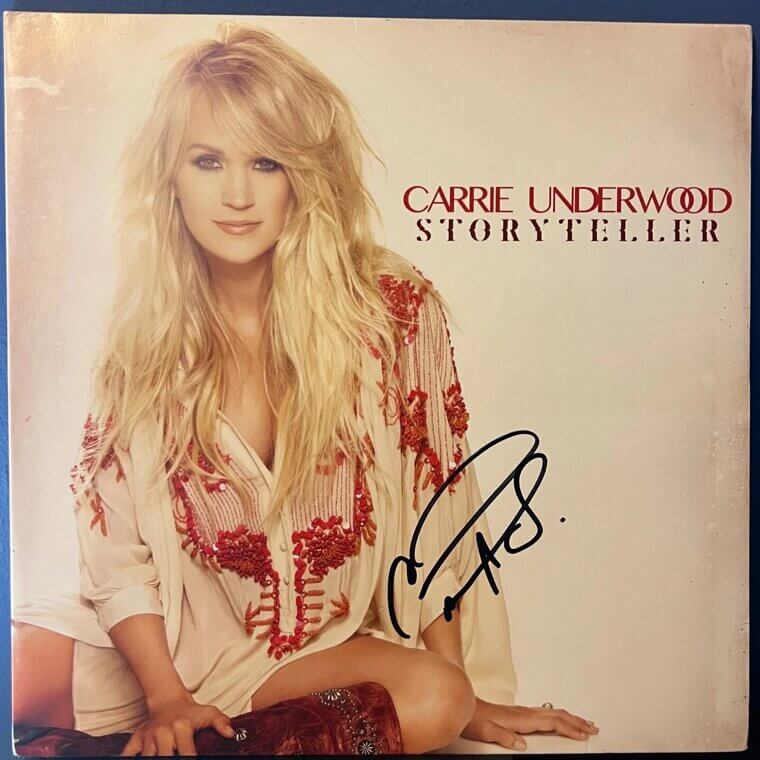 Carrie Underwood's Signed Photos and Albums - $500