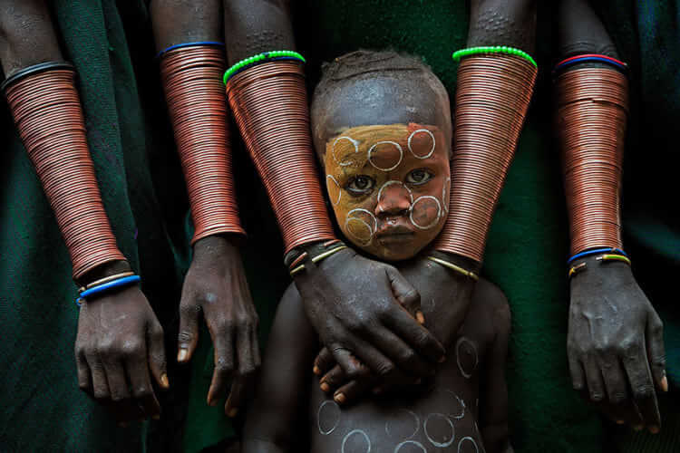 Kid With Hand Crafts, Ethiopia (Fascinating Faces And Characters Category: First Place)