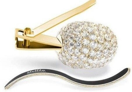 1.201.660 Cortaúñas con incrustaciones de diamante