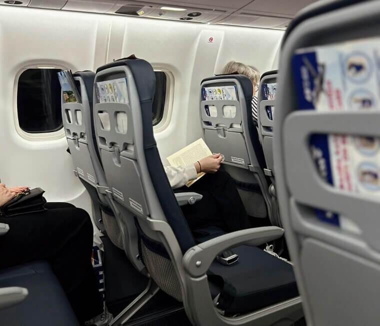 Why the Window Seat Is Secretly a Back Pain Trap