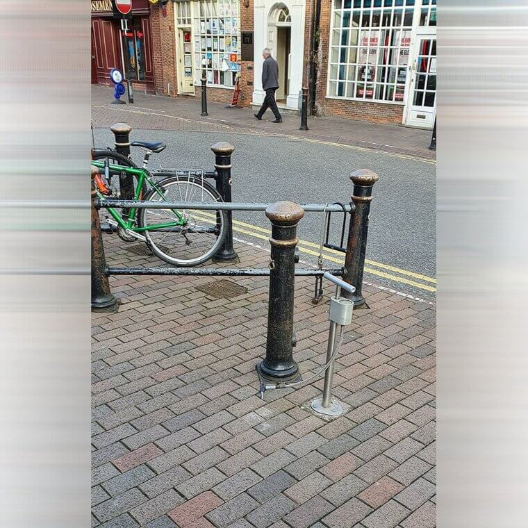 A Permanent Street Bicycle Pump Positioned Right by the Bike Lock Area