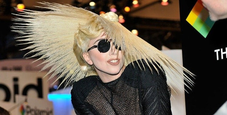Gaga Is Giving Mr. Hat Hair Some Competition