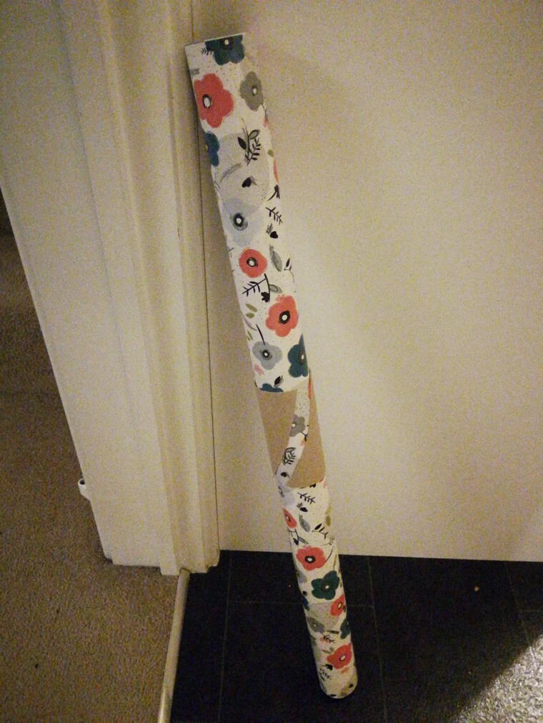 Keep Wrapping Paper From Unrolling With a Toilet Paper Tube
