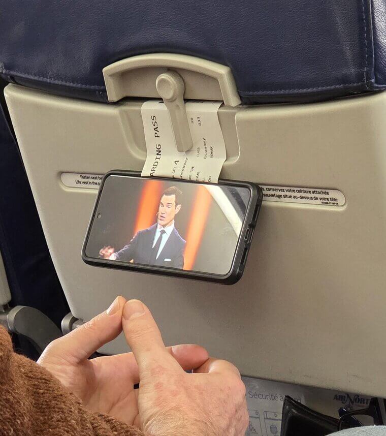 Use Your Boarding Pass To Hold Your Phone On A Plane